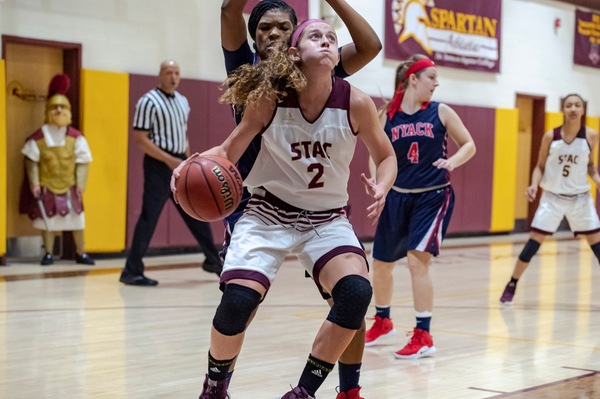 Sadler Nets 23 as STAC Moves into First Place with 70-55 Victory over NYIT